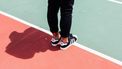 man op tennisbaan